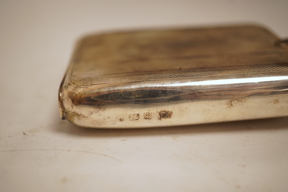 A George V engine turned silver hip flask, William Neale Ltd, Birmingham, 1924, 92mm, 89 grams.